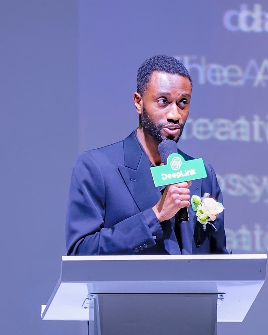 Joel Roberts speaking at a technology conference